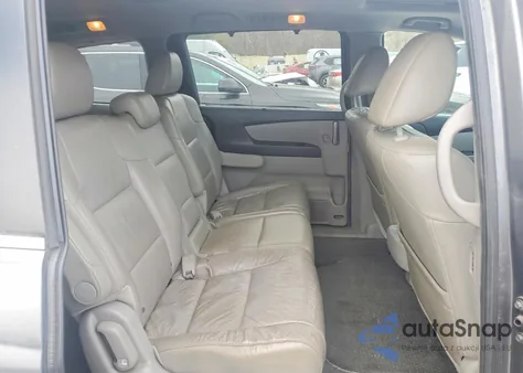 2012 Honda Odyssey Exl z USA, uszkodzony, nr VIN 5FNRL5H69CB050390